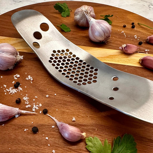 Garlic press/ herb stripper